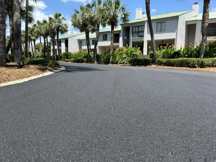 Close view of a smooth new asphalt surface after paving