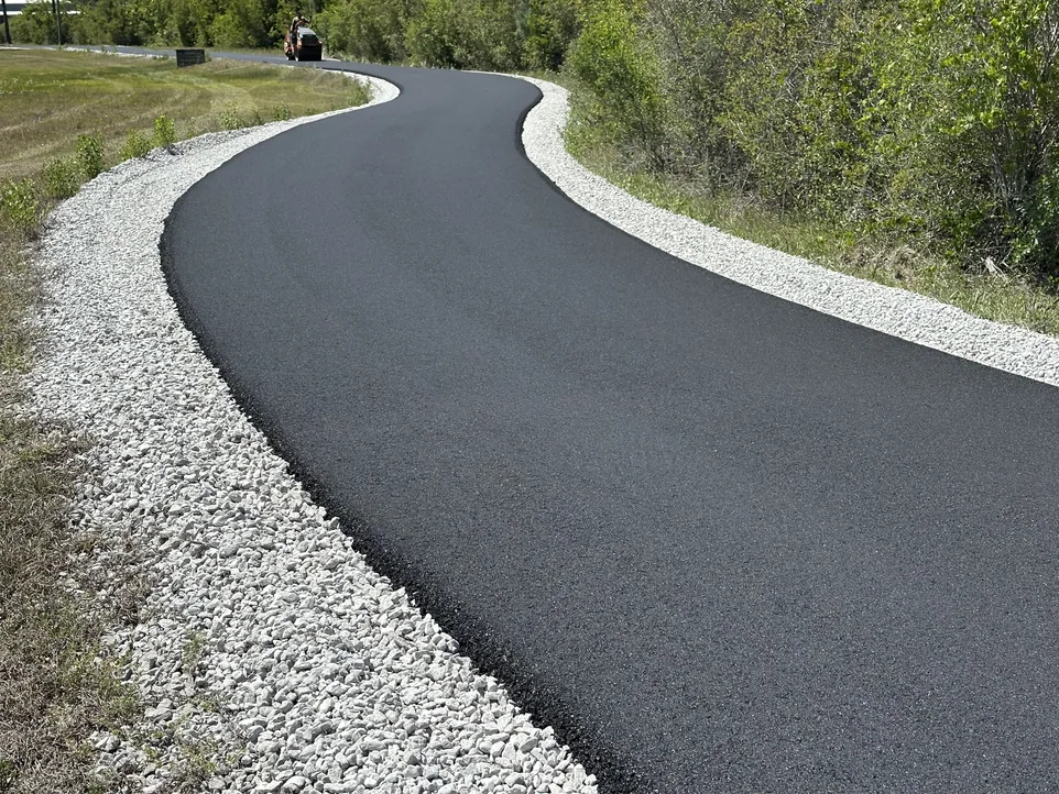Brand new asphalt driveway on a solid base