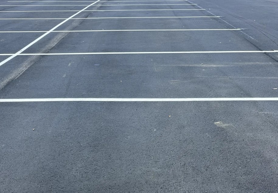 Fresh striping on a newly paved lot